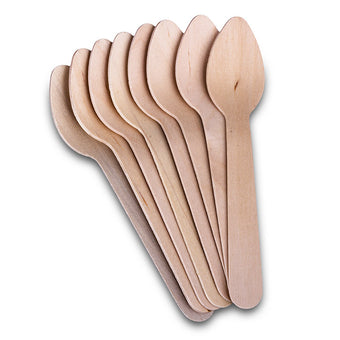 Set of wooden spoons on a white background