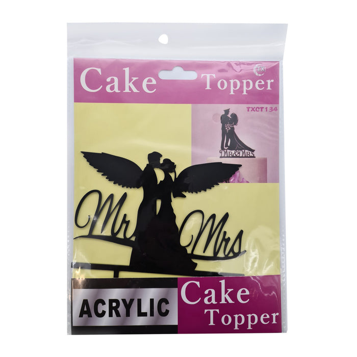 Cake topper in packaging with 'Mr' and 'Mrs' design on a white background