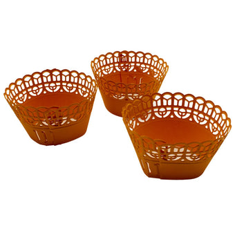 Adjustable orange cupcake wrappers on a white background