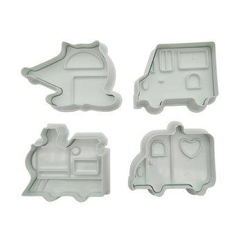 Set of white plastic transport fondant plunger cutters on a white background.