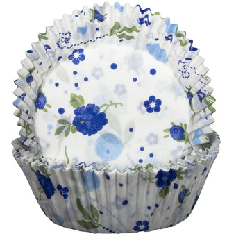 Floral cupcake liner with blue and green flowers on a white background