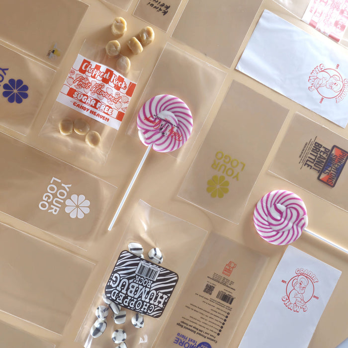 Assortment of personalised printed packaging bags made by Yolli showing design variety