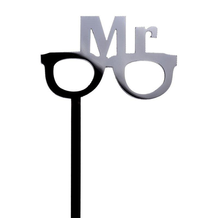 Black and silver 'Mr' glasses on a white background