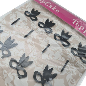 Black decorative cake toppers in a clear packaging with 'TopCake' branding.