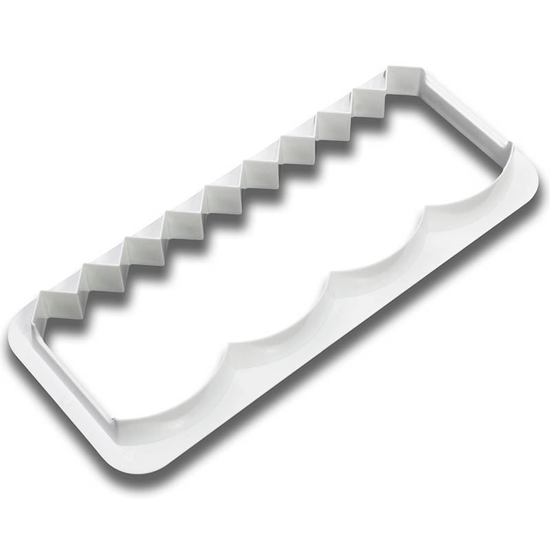 White plastic Fondant Edging Cutter Waves and Jagged on a white background