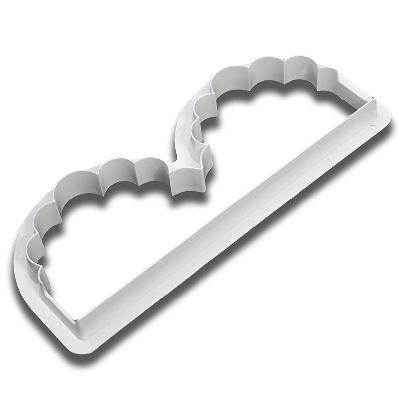 White plastic wavy design edge cutter on a white background