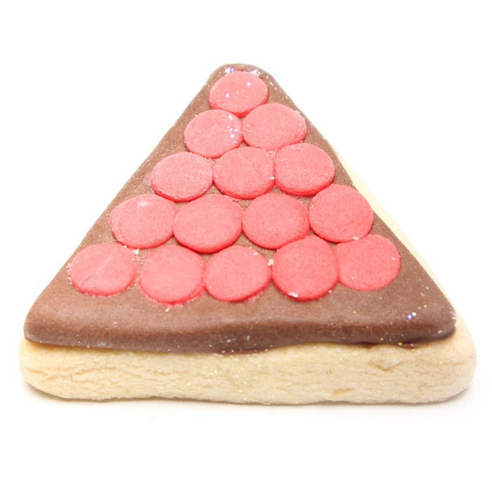 Triangular cookie with red and brown decorations on a white background