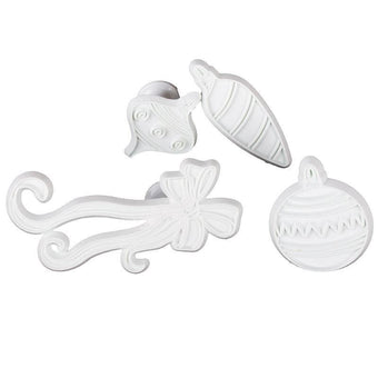 Set of white decorative fondant veiner on a white background