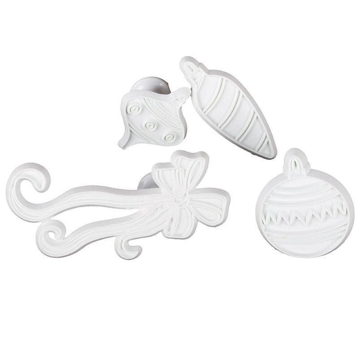 Set of white decorative fondant veiner on a white background