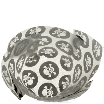 Tulip cupcake cases with skull and crossbones pattern on a white background