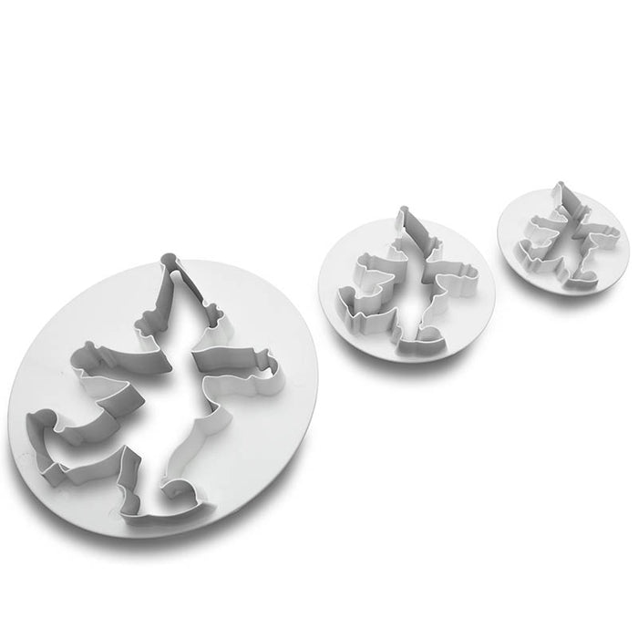 Set of fondant cutters shaped like clowns on a white background