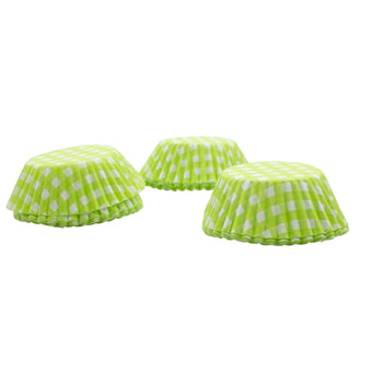 Green checkered cupcake liners on a white background