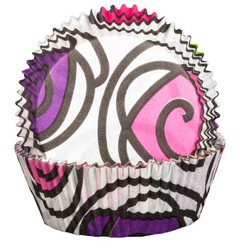 Cupcake liner with pink, purple, and black abstract design on a white background