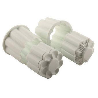 Set of cookie cutters with floral designs on a white background