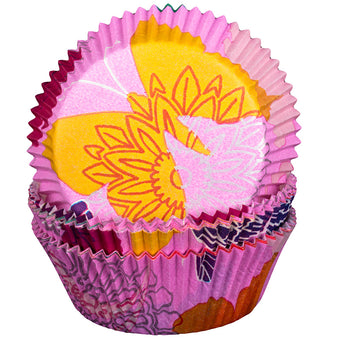 Colorful cupcake liner with floral design on a white background