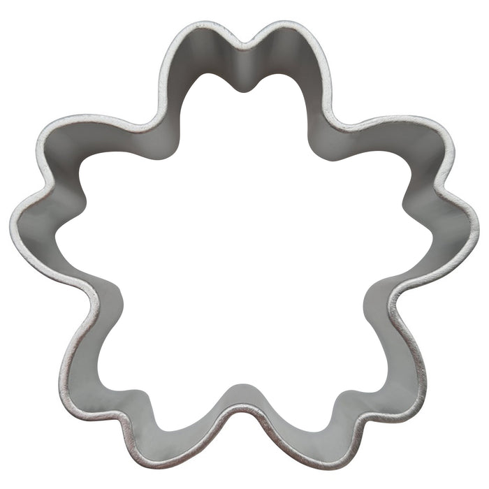Stainless steel flower-shaped cookie cutter on a white background