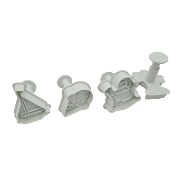 Set of four white plunger cutters on a white background