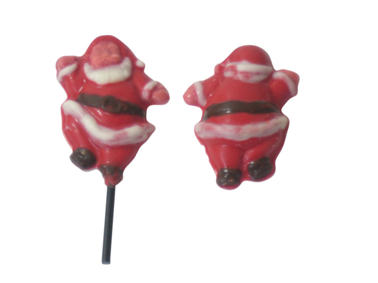 Two red and white Santa Claus figures on black sticks against a white background