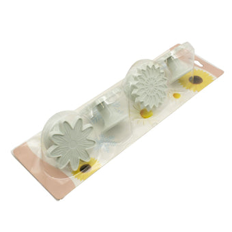 Set of floral fondant veiners on a pink and yellow packaging