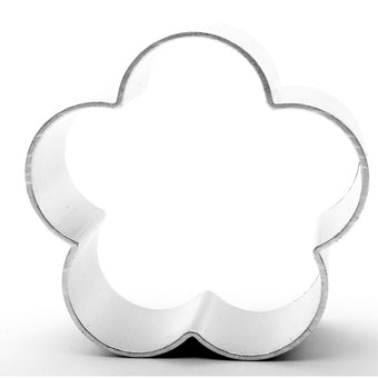 Flower-shaped cookie cutter on a white background