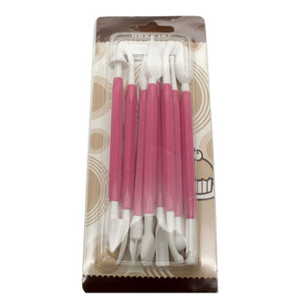 Set of pink-handled modelling tools in a clear plastic package with a decorative background