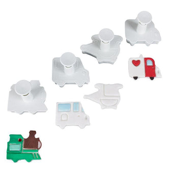Set of white plastic transport fondant plunger cutters on a white background