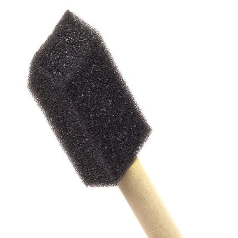 Black foam brush on a wooden handle against a white background