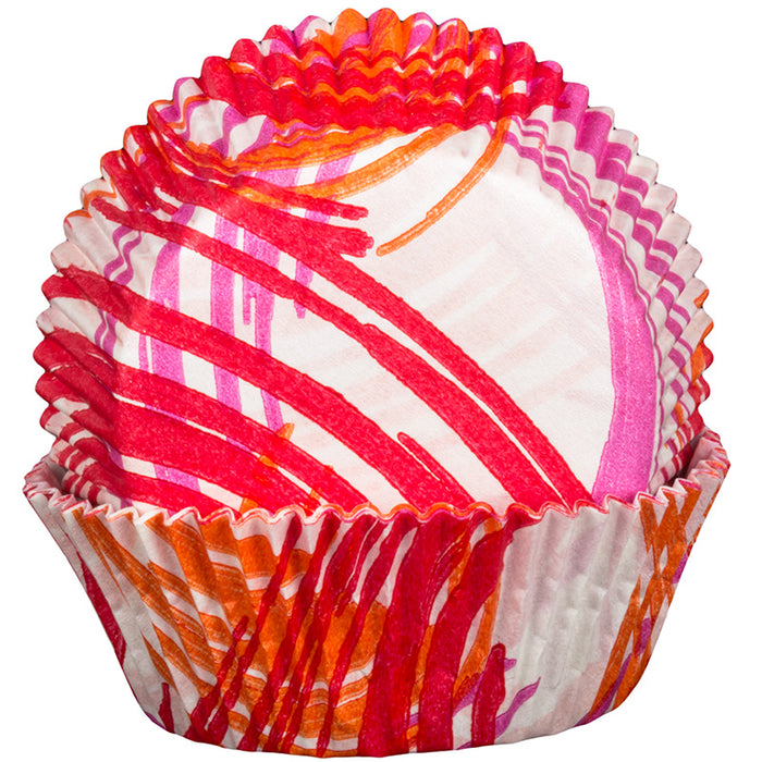 Colorful cupcake liner with red, orange, and white pattern on a white background