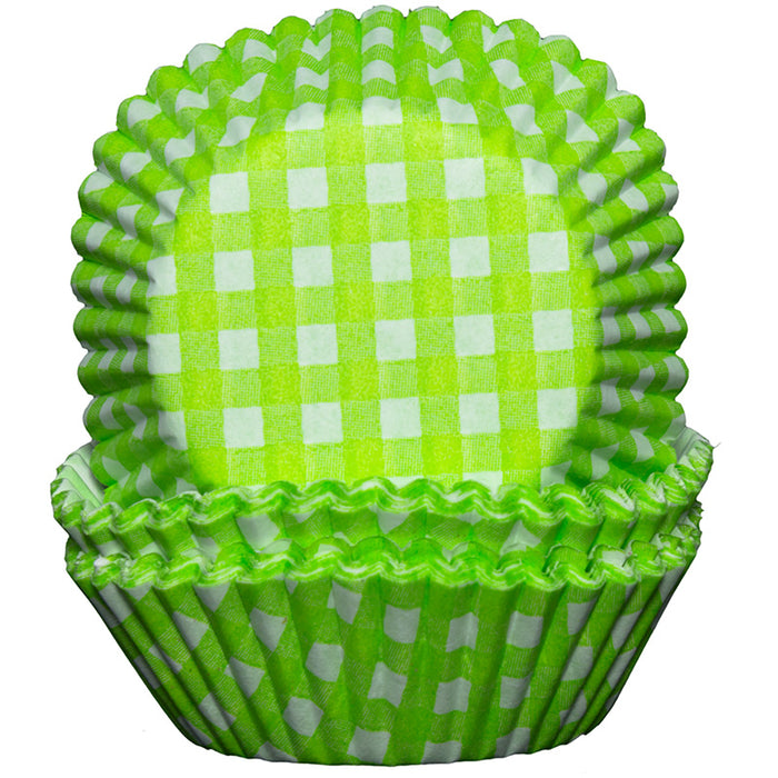 Green and white checkered cupcake liner on a white background
