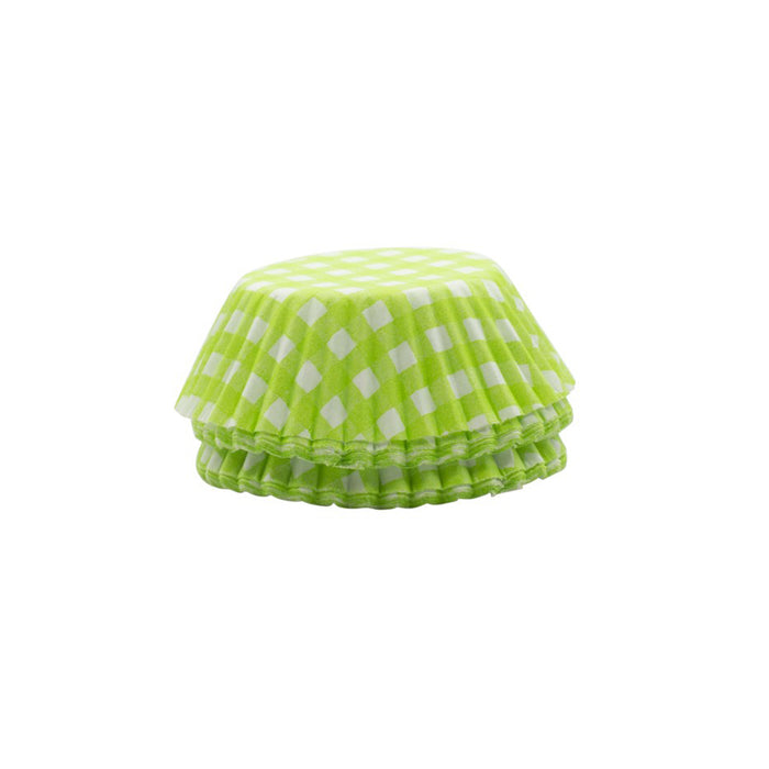 Green and white checkered cupcake liners on a white background