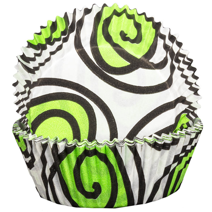 Cupcake liner with green, black, and white pattern on a white background