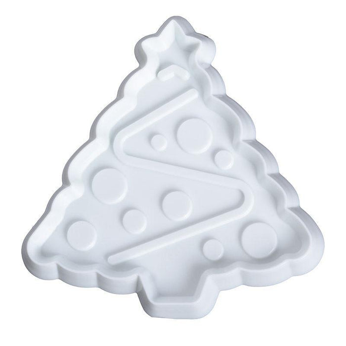 White Christmas tree-shaped fondant cutter on a white background