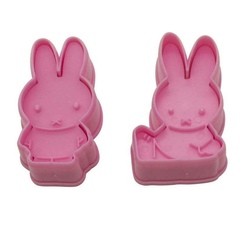 Two pink bunny-shaped plunger cutters on a white background