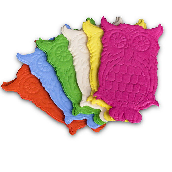Set of colorful owl-shaped  cake toppers on a white background