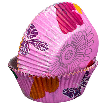 Floral patterned cupcake liner on a white background