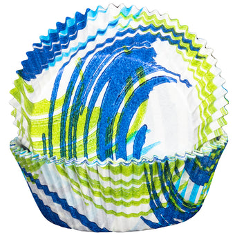 Stack of blue and green cupcake liners with wavy pattern