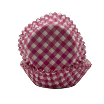Pink and white checkered cupcake liner on a white background