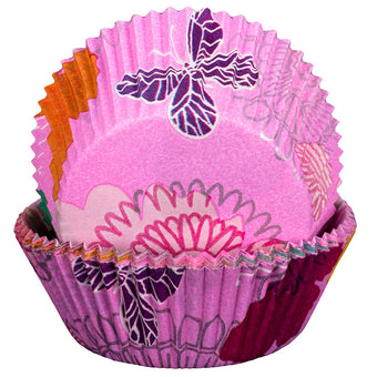 Colorful cupcake liners with floral designs on a white background