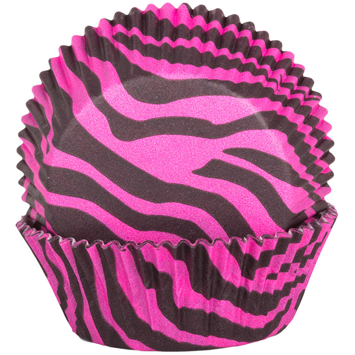 Pink and black zebra patterned cupcake liners on a white background