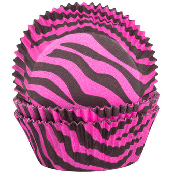 Pink and black zebra patterned cupcake liners on a white background