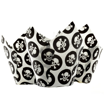 Three paper cupcake cases with skull and crossbones design on a white background