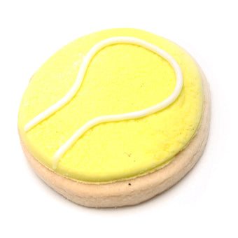 Cookie shaped like a tennis ball with yellow surface and white lines on a white background