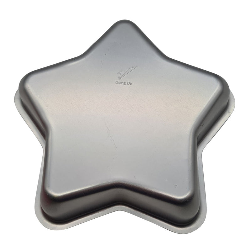 Star-shaped metal cake pan on a white background