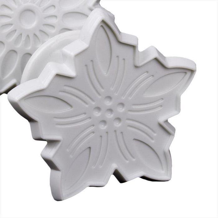 White floral pattern fondant veiner on a white background