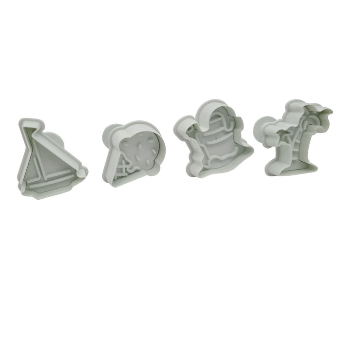 Set of plunger cutters including a palm tree, ice cream cone, sailboat and bucket and spade on a white background 