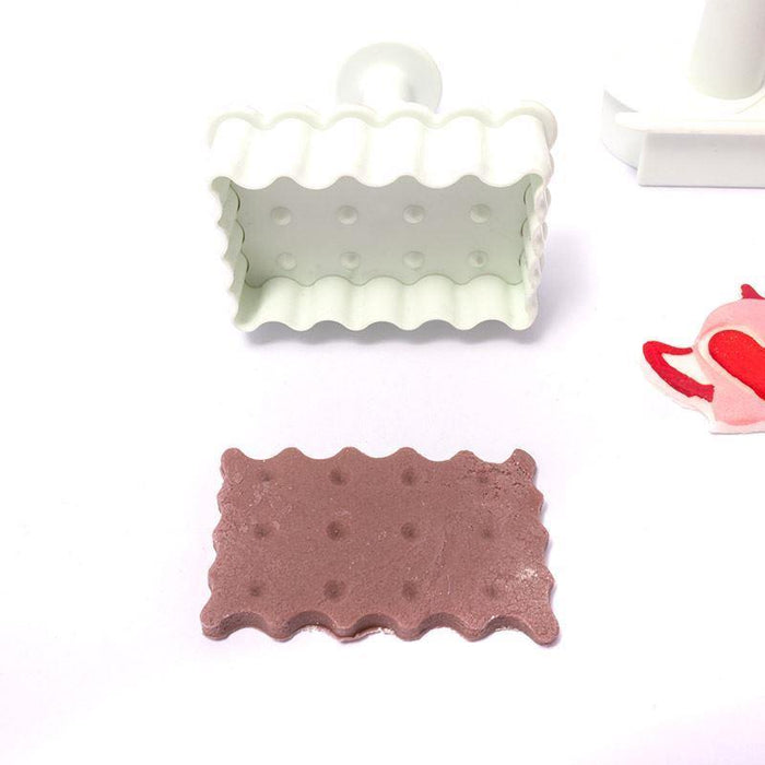 Set of four plunger cutters on a white background