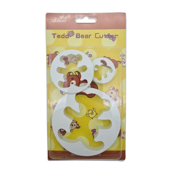 Teddy bear-shaped fondant cutters in packaging with a yellow background