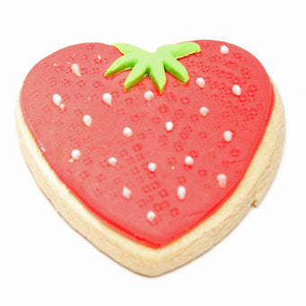 Heart-shaped cookie decorated like a strawberry on a white background
