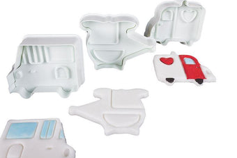 Set of white plastic transport fondant plunger cutters on a white background.