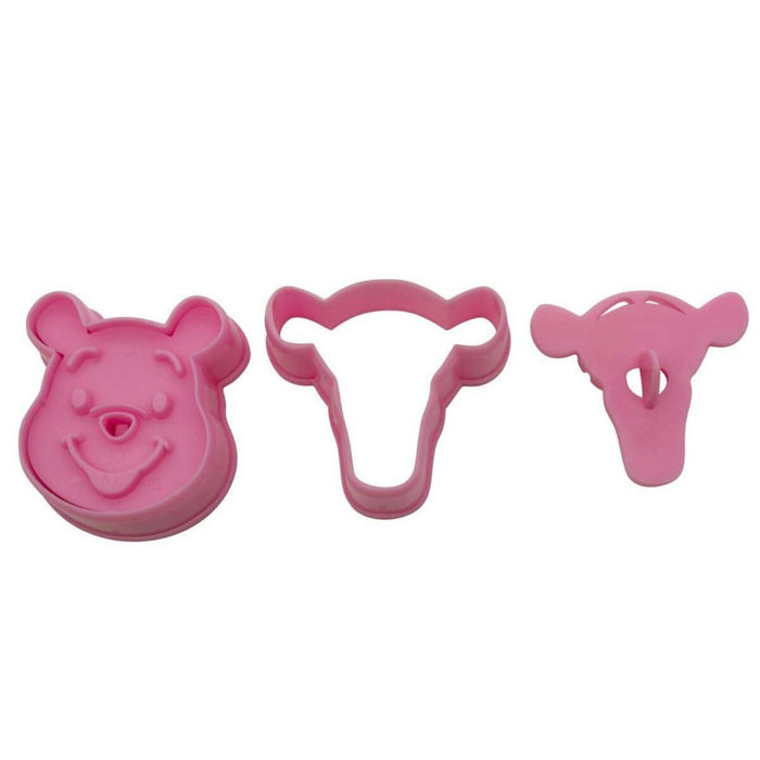 Set of two pink cookie cutters shaped like Winnie and Tigger, on a white background.